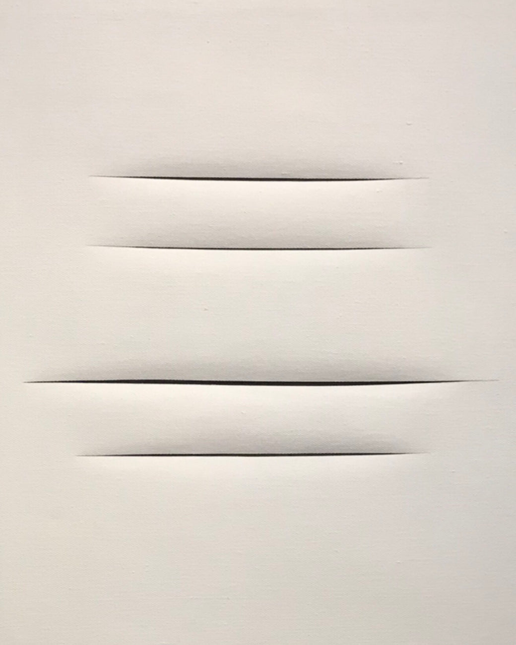 Lucio Fontana Concetto Spaziale slashed canvas artwork — fine art investment analysis by Theresa Rézeau