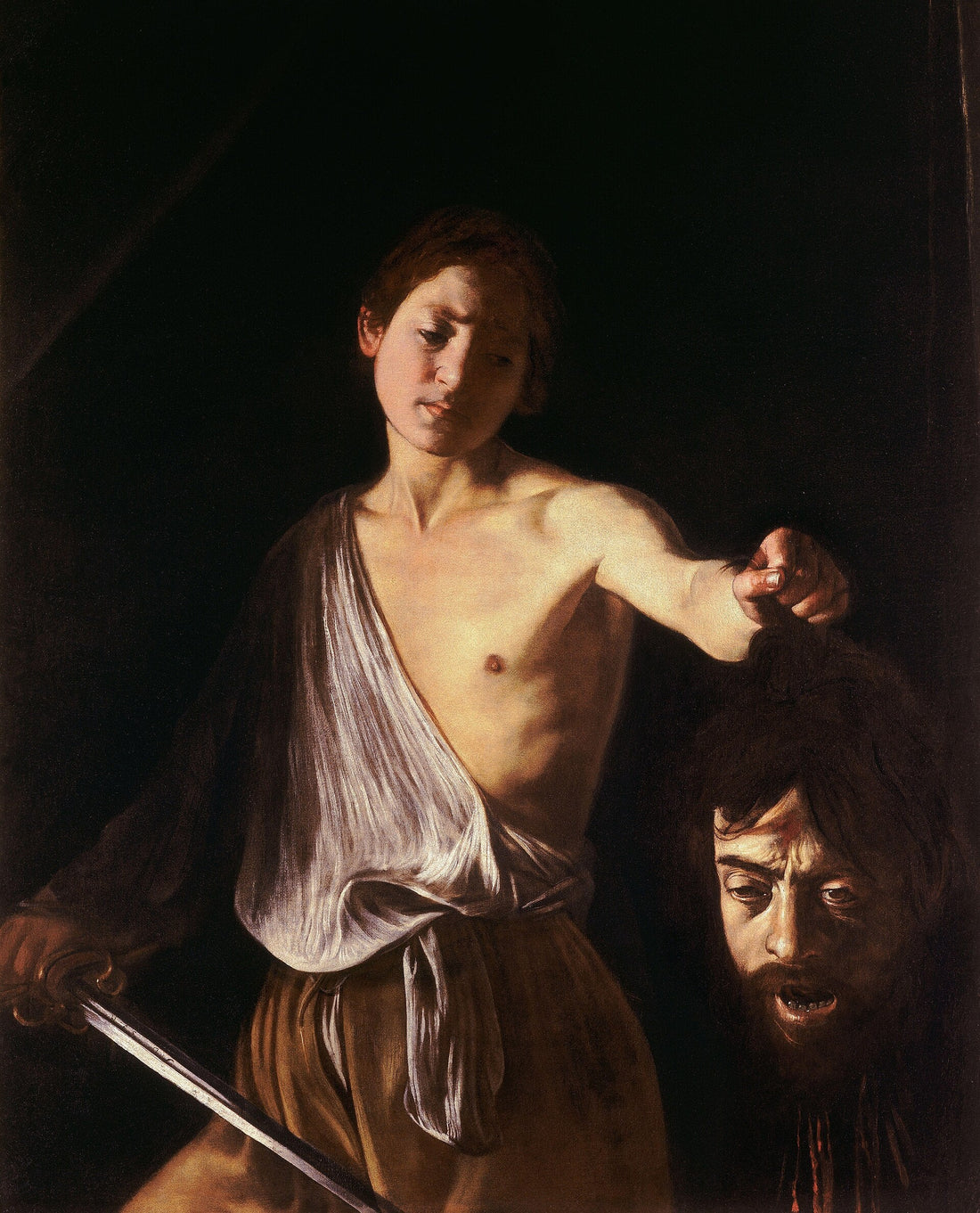 Caravaggio, David with the Head of Goliath, c. 1609–10, showing David holding the severed head of Goliath.